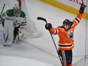 Edmonton Oilers Leon Draisaitl (29) celebrates his goal and 100th point on Dallas Stars goalie Anton Khudobin (35) during NHL action at Rogers Place in Edmonton, March 28, 2019.
