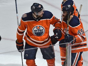 Edmonton Oilers Leon Draisaitl (29) celebrates his hat trick with Joseph Gambardella (45) against the Los Angeles Kings during NHL action at Rogers Place in Edmonton, March 26, 2019.