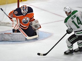 Edmonton Oilers goalie Mikko Koskinen (19) gets scored on in the shootout by Dallas Stars Jamie Benn (14) to win the game 3-2 during NHL action at Rogers Place in Edmonton, March 28, 2019. Ed Kaiser/Postmedia