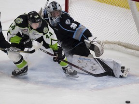 Edmonton Oil KIngs Carter Souch (44) can't get the puck past Kootenay Ice goaltender during WHL action on Sunday, March 10, 2019, in Edmonton.