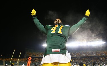 Edmonton Eskimos Odell Willis celebrates the win over the Saskatchewan Roughriders CFL semi finals action at Commonwealth Stadium in Edmonton, AB on Sunday, November 16, 2014.  Perry Mah/Edmonton Sun