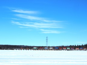 A CNR freight train on the Lake Wabamun causeway while Neil Waugh was ice-fishing for walleye.