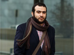 Omar Khadr leaves Court of Queen's Bench in Edmonton on Monday, March 25, 2019 after a judge declared his sentence expired.
