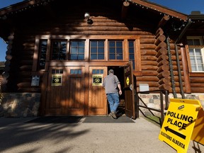 A voter heads to vote at a polling station at the Old Timers Cabin in Edmonton, on April 16, 2019. More than 2.6 million Albertans are registered to vote in the 2019 provincial election.