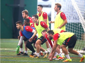 Cavarly FC keeper Marco Carducci (blue) guards the line during a free kick in Calgary during day two of the Canadian Premier League team's inaugural training camp on Wednesday, March 6, 2019.