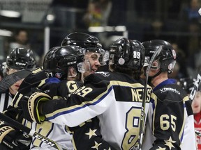 The Lacombe Generals celebrate Chase Norrish's first period goal against the Innisfail Eagles during the 2019 Allan Cup final at the Gary Moe Auto Group Sportsplex in Lacombe, Alta., on Saturday, April 13, 2019.