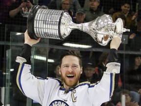 Lacombe Generals captain Brennan Evans hoists the Allan Cup following their 5-2 win over the Innisfail Eagles at the 2019 Allan Cup final at the Gary Moe Auto Group Sportsplex in Lacombe, Alta. on Saturday, April 13, 2019.