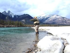 Neil swings a double-handed spey rod for bull trout on the Athabasca River in Jasper National Park.
