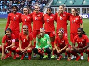 Canada players line up prior to the International Friendly between England Women and Canada Women at The Academy Stadium on April 05, 2019 in Manchester, England.