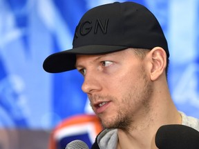 Edmonton Oilers forward Alex Chiasson speaks to media as players clean out their lockers at Rogers Place in Edmonton on April 7, 2019.