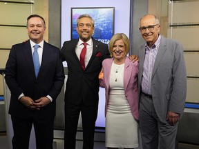 Alberta UCP leader Jason Kenney, Alberta Liberal Party leader David Khan, Alberta NDP leader Rachel Notley and Alberta Party leader Stephen Mandel (left to right) pose for a photo before the party leaders debate held at CTV Edmonton studios on Thursday April 4, 2019.