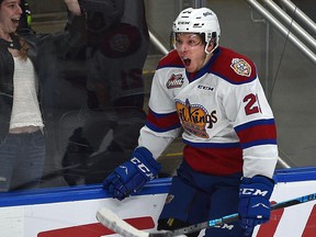 Edmonton Oil Kings Jake Neighbours (21) celebrates scoring the tying goal with 13 seconds left to force overtime against the Calgary Hitmen during WHL second round playoff action at Rogers Place in Edmonton, April 6, 2019.
