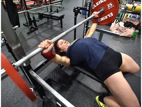 Teresa Parsons is a powerlifter and is heading in June to the World Power Lifting Championships in Sweden, working out in the Evolve Strength North gym in Edmonton, April 3, 2019.