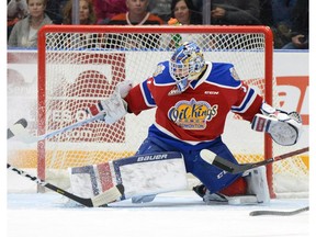 Edmonton Oil Kings goaltender Dylan Myskiw kicks out his right pad for a save during Game 3 of the Western Hockey League's Eastern Conference quarter-final series against the Medicine Hat Tigers on Tuesday, March 26, 2019, at the Canalta Centre.
