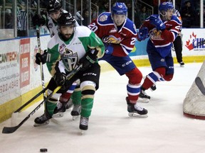 Prince Albert Raiders forward Dante Hannoun (17) battles with Edmonton Oil Kings forward David Kope (20) in Game 1 of the WHL Eastern Conference Final at the Art Hauser Centre in Prince Albert, Sask., on Friday, April 20, 2019.