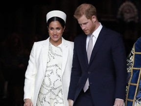 Meghan, the Duchess of Sussex and Britain's Prince Harry leave after attending the Commonwealth Service at Westminster Abbey on Commonwealth Day in London March 11, 2019. (AP Photo/Frank Augstein, File)