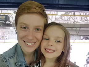 Rachele Mandrusiak and daughter Stirling at Saturday's 24-hour hockey game.