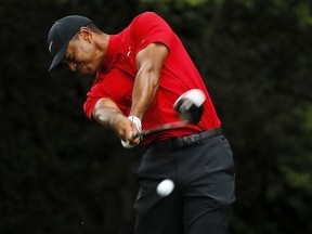 Tiger Woods plays his shot from the second tee during the final round of the Masters at Augusta National Golf Club on April 14, 2019 in Augusta, Georgia.