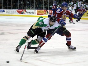Prince Albert Raiders forward Noah Gregor  (18) battles with Edmonton Oil Kings defenceman Wyatt McLeod of the WHL Eastern Conference Final at the Art Hauser Centre in Prince Albert, Sask., on Friday, April 20, 2019.