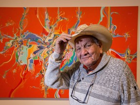 Canadian Alex Janvier in front of "Lubicon" painted in 1988.