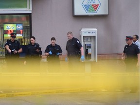 Edmonton police are seen at a convenience store at 167 Avenue and 76 Street for a call of a weapons complaint on Wednesday, May 22, 2019.