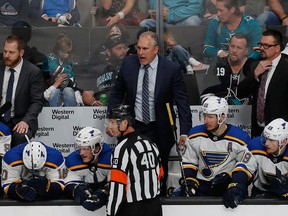 St. Louis Blues' head coach Craig Berube, centre, reacts on the bench in the third period in Game 1 of the NHL hockey Stanley Cup Western Conference finals against the San Jose Sharks in San Jose, Calif., Saturday, May 11, 2019.