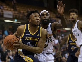 The Edmonton Stingers' Mathieu Kamba (9) battles the Saskatchewan Rattlers' Bruce Massey (13) during second half CEBL action, at the Edmonton EXPO Centre Friday May 31, 2019. Edmonton won 93 to 84. Photo by David Bloom