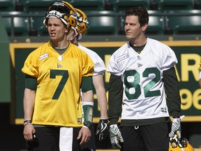 Edmonton Eskimos quarterback Trevor Harris (7) and wide receiver Greg Ellingson (82) take part in training camp in Edmonton, Alta., on Sunday May 19, 2019.