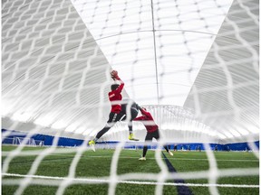 Goalkeepers Jackson Vinci and Dylon Powley use a giant swiss ball to throw each other around in the penalty area in front of the net. FC Edmonton is practising from at the Edmonton Soccer Dome on April 22, 2019 to prepare for the upcoming CPL season in Edmonton.