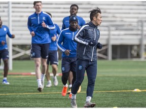 FC Edmonton midfielder Son Yong-Chan leads a drill at practice at Clarke Stadium on May 9 2019, ahead of their Canadian Premier League home opener on Sunday against Pacific FC.
