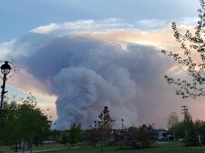 Smoke column can be seen from the Town of High Level on May 21, 2019. (Supplied photo/Government of Alberta)