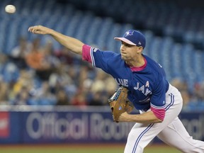 Toronto Blue Jays starting pitcher Aaron Sanchez throws against the Chicago White Sox in Toronto on May 12, 2019. The Rogers Centre was half-full despite a "Marcus StroGnome" giveaway. (FRED THORNHILL/The Canadian Press)