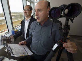 Announcers Michael Wrona, right, and Ken Gee pose for a photo at the Century Mile Racetrack and Casino, in Edmonton Saturday May 4, 2019.