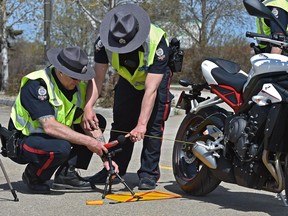 The Edmonton Police Service Traffic Section conducted motorcycle sound measurement testing to learn whether bikes meet requirements under the municipal noise bylaw at the NAIT South Campus in Edmonton, May 11, 2019. Riders whose bikes failed the sound test were given amnesty from receiving a ticket and might need to have their exhaust altered. Ed Kaiser/Postmedia