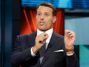 March 17, 2016, file photo, motivational speaker Tony Robbins is interviewed during a taping of "Wall Street Week," on the Fox Business Network in New York.