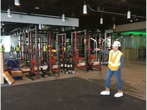 Simon Bennett displays some of the equipment for his new gym, Archetype, on the fifth floor of the Marriott Hotel in Ice District