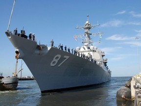 In this image released by the US Navy, the Arleigh Burke-class guided-missile destroyer USS Mason departs Naval Station Norfolk on August 25, 2011 ahead of Hurricane Irene.