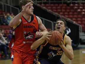 Fraser Valley Bandits Dallin Bachynski (left) defends against Edmonton Stingers Brody Clarke (right) during Canadian Elite Basketball League game action in Edmonton on Friday June 7, 2019.