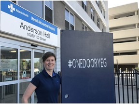 Catherine de Beaudrap, patient advocate, stands outside the Access 24/7 site at Anderson Hall.