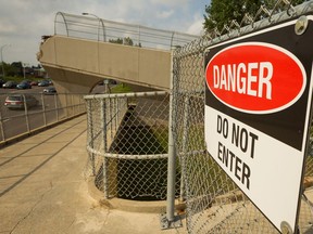 The remnants of the 170 Street footbridge connecting to West Edmonton Mall are seen in Edmonton, on Friday, June 21, 2019. Photo by Ian Kucerak/Postmedia