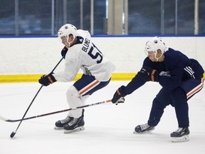 Matej Blumel (51) battles Patrik Siikanen (61) during Billy Moores Cup action at Edmonton Oilers 2019 Development Camp at the Rogers Place Downtown Community Arena in Edmonton, on Thursday, June 27, 2019. Photo by Ian Kucerak/Postmedia
