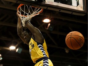 Edmonton Stingers' Travis Daniels (30) dunks on the Niagara River Lions during CEBL action at Edmonton Expo Centre in Edmonton, on Friday, June 28, 2019.