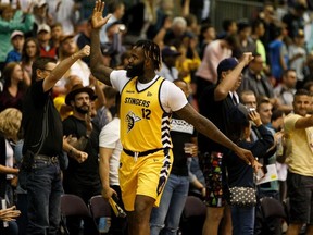 Edmonton Stingers' Akeem Ellis (12) gets the crowd cheering as the final seconds of a 105-99 win ticks down on the Niagara River Lions during CEBL action at Edmonton Expo Centre in Edmonton, on Friday, June 28, 2019.
