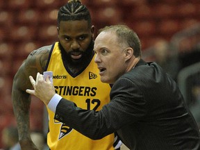 Barnaby Craddock (right), the inaugural head coach and general manager of the Canadian Elite Basketball League's Edmonton Stingers, stepped down Wednesday June 19, 2019, citing strains the added workload placed on his ongoing duties coaching the University of Alberta Golden Bears basketball program and raising a young family. (PHOTO BY LARRY WONG/POSTMEDIA)
