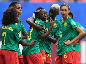 Ajara Nchout of Cameroon (C) reacts after her goal is disallowed via a VAR decision during the 2019 FIFA Women's World Cup France Round Of 16 match between England and Cameroon at Stade du Hainaut on June 23, 2019 in Valenciennes, France.