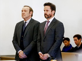 Actor Kevin Spacey (L) attends his arraignment on sexual assault charges with his lawyer Alan Jackson at Nantucket District Court on January 7, 2019 in Nantucket, Massachusetts.