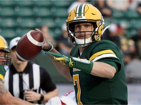 Edmonton Eskimos quarterback Trevor Harris looks for a receiver during CFL game action against the Montreal Alouettes in Edmonton on Friday, June 14, 2019.