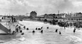 This photo, provided by the Imperial War Museum to AFP/Getty Images, was taken on June 6, 1944, and shows Canadian soldiers from 9th Brigade landing with their bicycles at Juno Beach in Bernieres-sur-Mer as Allied forces storm Normandy beaches in northwestern France on D-Day.