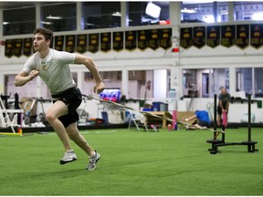 Kirby Dach works out at Edmonton's Shamrock Curling Club on June 17, 2019.