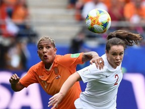 Netherlands forward Shanice van de Sanden vies with Canada's defender Allysha Chapman during the Women's World Cup Group E match at the Auguste-Delaune Stadium in Reims, France, on June 20, 2019.
